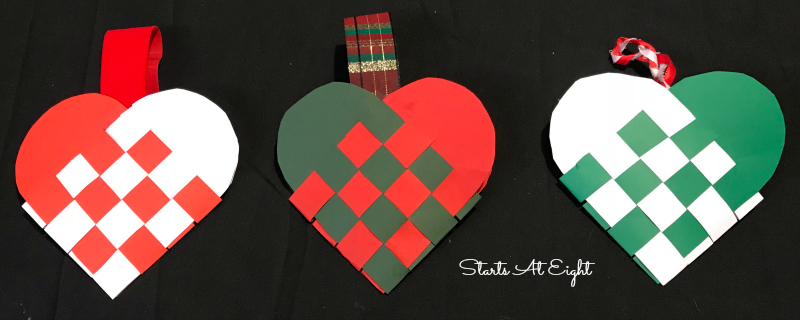 Christmas Crafts: Swedish Woven Heart Paper Craft Tutorial. Grab some card stock, ribbon, scissors, and glue to craft a woven heart basket or ornament. from Starts At Eight